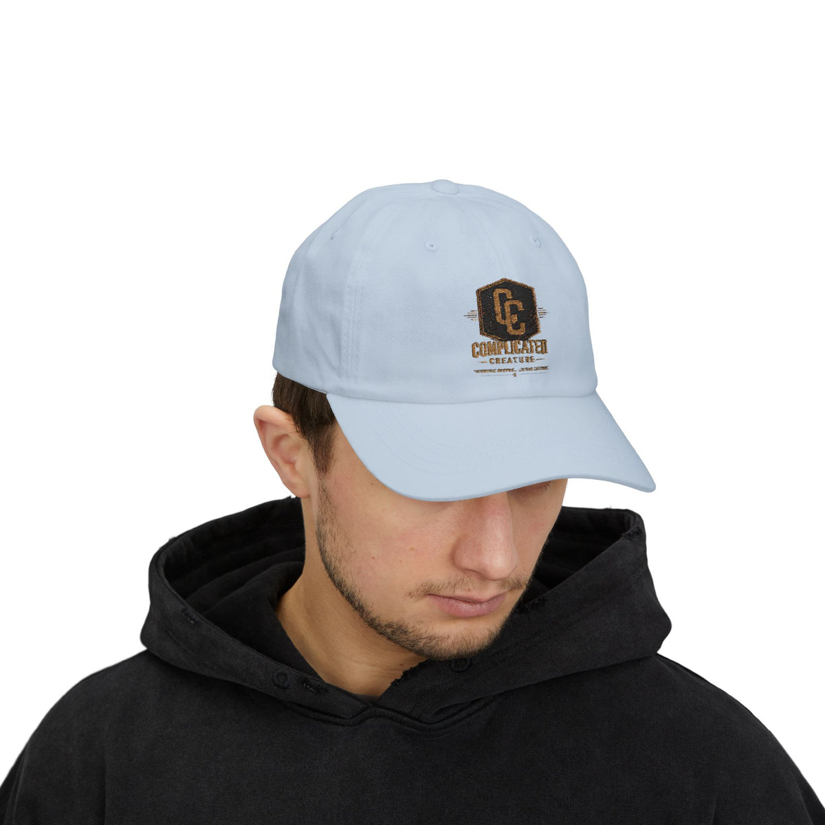 Complicated creature badge hat